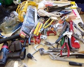 Table full of Hand Tools and Cords - Shop