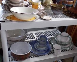 All the different Dinner and Stoneware in the house garage