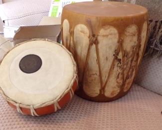 left is a Gourd Drum and the other is a Twisted Hyde Drum, both from Africa 
