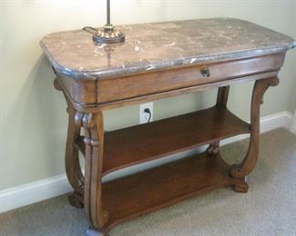 We have two of these Marble Topped Hall Tables.