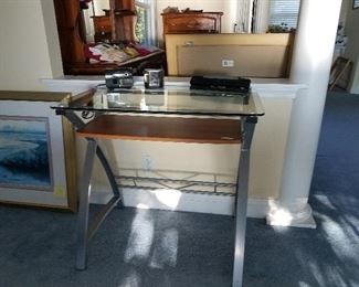 Chrome and glasstop desks