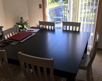 Large wood dining table with 8 chairs