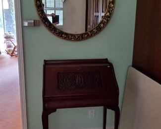 Carved wood secretary desk & ornate wall mirror
