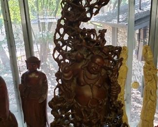 Over 3 foot tall hand carved Rosewood sculpture of Hotei/ Budai with about 70 children crawling all over him. Another museum quality piece.