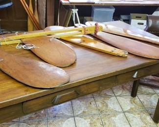 Antique table...collection of vintage rudders..