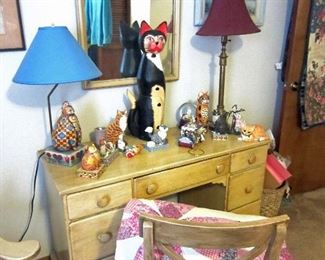 Antiqued desk set  with JIM STONE cat figurines on top and another quilt