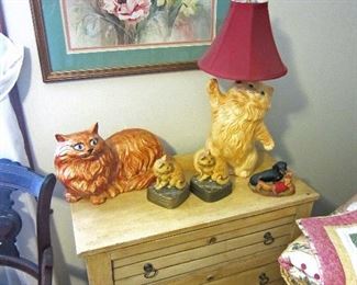 Antiqued chest and cat figurines