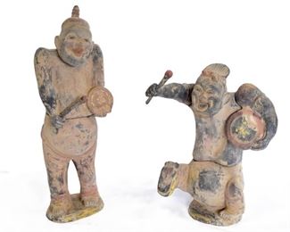 A Pair of Terra Cotta and Polychrome Drummers