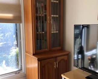 Lighted bookcase/cabinets (there are 2 total though only 1 is photographed)