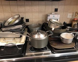 Tons of pots and pans and kitchen miscellaneous......