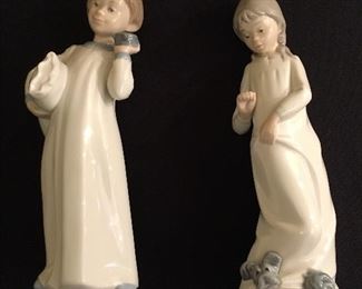 Zaphir Lladro:  boy, pillow & clock; girl 'my playful puppy'