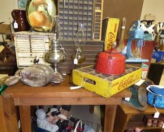 The following pictures are of the Hangar:  Primitive items, Vintage Wooden Coca Cola crates, Printer Drawers, Large wooden pulley, Black Americana dolls