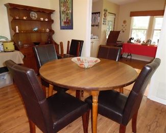 Wood dining table with leaves and pads