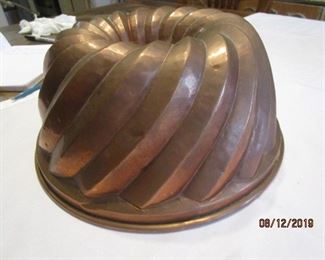Copper bundt pan.  Very unusual.