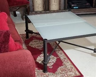 Glass and metal coffee table