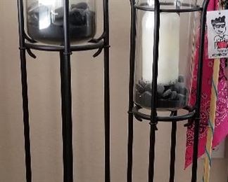 Large candle votives on metal stands