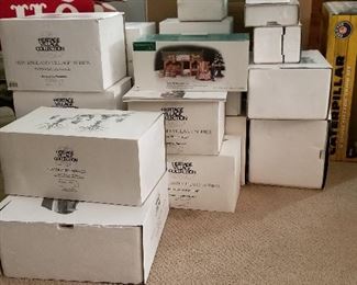 In boxes Heritage Village collectibles.