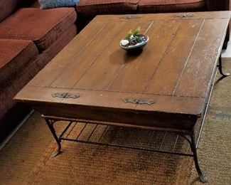 Wood and metal coffee table opens up both sides