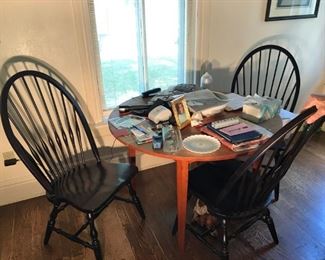Small occasional table with unique chairs