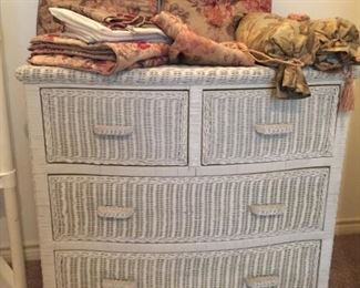 White wicker chest, bed pillows & bedskirt