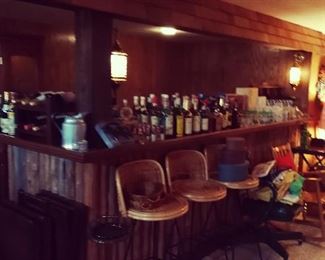 Vintage Wicker Bar Stools / Old Rocking Chair / MCM Lamps / Barware / Basement Home Bar Accessories 
