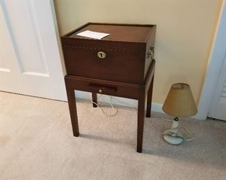 Mahogany casket table with candle pull out shelf 