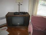 This old 1960's tv set works! Put together with the LR furniture yiou could re-create a 1950's LR is your home!!! retro is all the rage right???