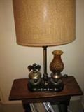 This is one of the eagle themed lamps are thru out the house. This one is very different- it has an electric hurricane lamp as well as the regular lamp!