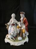 This figurine depicts a man and woman w/ their faithful dog! This vintage piece is Empress by Haruta also made in Taiwan