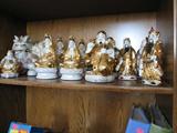 Different oriental statues - very elaborate textured paint and a Foo Dog.