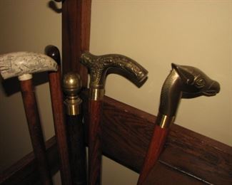collection of walking sticks & canes 
