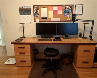 DESK = 25.5" DEEP X 85.5" WIDE X 29" HIGH (TYPICAL HEIGHT OF A DESK)
WOOD IS SOLD MAPLE FRAMED IN AN EXOTIC RED WOOD
TOP OF DESK IS REMOVABLE (NO SCREWS) FROM THE 2 FILE CABINETS FOR EASY TRANSPORT
LEFT FILE CABINET - 2 UTILITY DRAWERS + BOTTOM FILE  W/ STAINLESS STEEL FILE RAILS
WOOD IS SOLD MAPLE W/ HANDLES THAT MATCH THE DESK FRAME
RIGHT CABINET = 2 FULL LENGTH FILE DRAWERS W/ STAINLESS STEEL FILE RAILS
WOOD IS SOLD MAPLE W/ HANDLES THAT MATCH THE DESK FRAME
THE BOX THAT YOU SEE IN THE PHOTO BETWEEN THE FILE CABINETS IS A PRIVACY BOX MEANT TO HIDE CABLES + WIRES AND SERVE AS A FOOT REST. IT IS INCLUDED.
ALL DRAWER HARDWARE IS COMMERCIAL GRADE STAINLESS STEEL AND DRAWERS OPEN CLOSE LIKE BUTTER!
DESK + CABINETS WERE BUILT BY A MASTER FURNITURE CRAFTSMAN AND ARE BUILT TO LAST FOR DECADES
BOTH HALOGEN END LAMPS INCLUDED W/ THE DESK