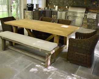 Restoration Hardware trestle table with bench and 4 wicker chairs
