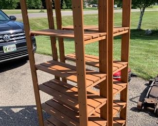 Two sets of wooden shelves