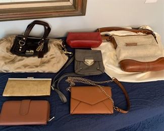 Designer purses including Coach and Isaac Mizrahi