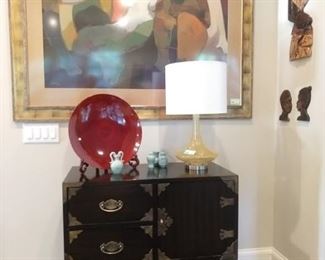 Asian inspired wooden/brass chest, by Thomasville, yellow glass lamp, by Surya, miniature celadon vase collection all overshadowed by "Somewhere in Time" by Hessam Abrishami, signed/numbered 57/100.