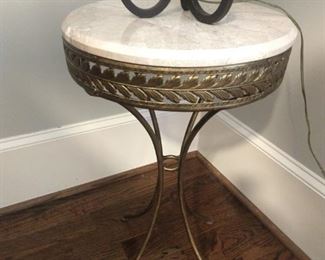 Sweet, little wrought iron side table, with white marble top.