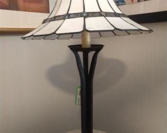 Cast iron base table lamp, w/stained glass shade.
