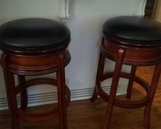 Pair swivel bar chairs