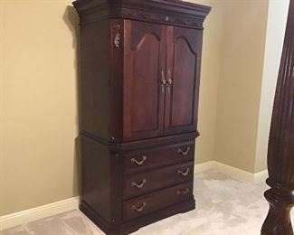 TV armoire with drawers.
