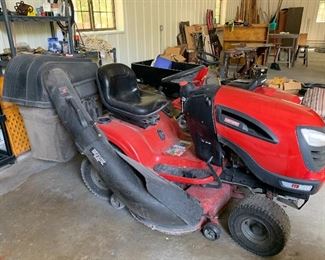 Riding Lawn Tractor with vacuum.