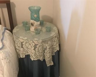 End table. Lace. Candle holders.