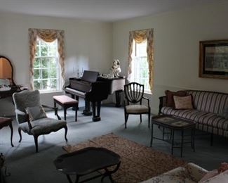 The formal living room is full of beautiful traditional furniture.
PLEASE NOTE THE PIANO IS NOT FOR SALE. CLIENT HAS PULLED THE PIANO FROM SALE. 