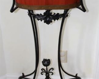 Iron base plant stand.