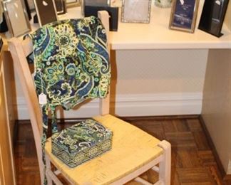 Vera Bradley apron, we have a large amount of frames throughout the house, chair and vases.  