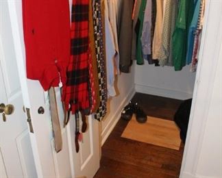 Closet is full of men's clothing.  Most are size large.  