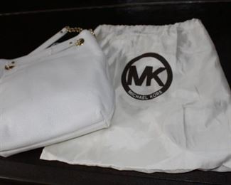White leather Michael Kors purse with dust cover.  