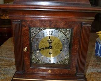 Vintage Howard Miller Mantel Clock with key.  Very heavy, all wood.