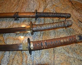 The bottom one is signed.