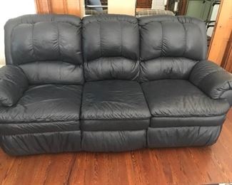 Leather (where you sit) reclining sofa